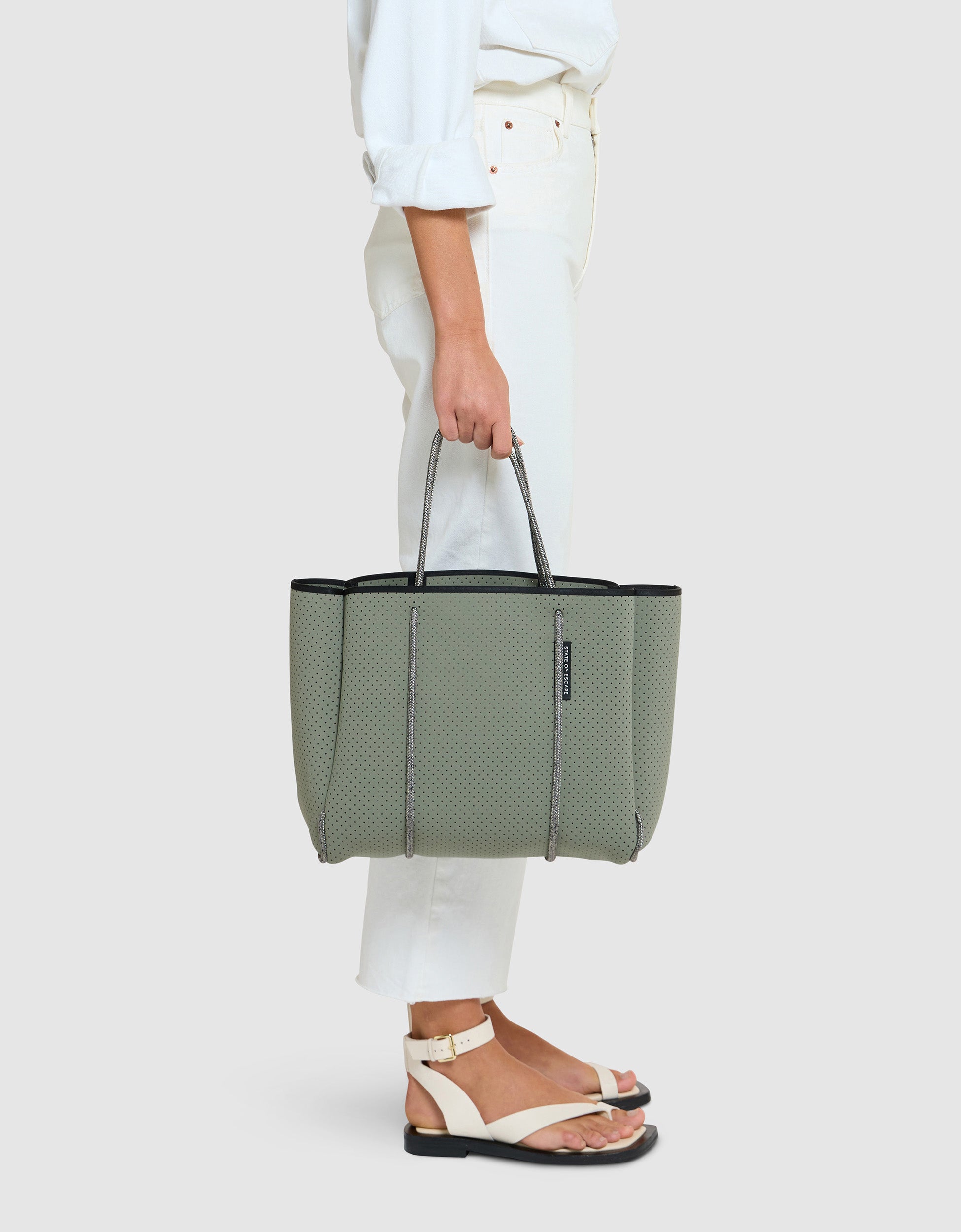 ステートオブエスケープ Flying Solo tote STATE OF ESCAPE | Flying Solo Perforated Tote Bag | Women